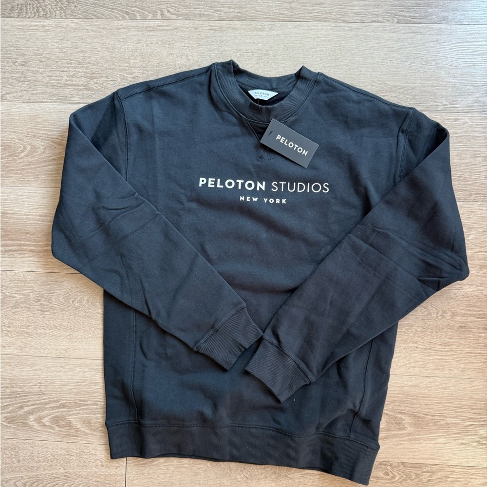 Peloton Black Crewneck Sweatshirt with White Peloton Studios Logo